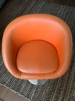 Orange faux leather chair