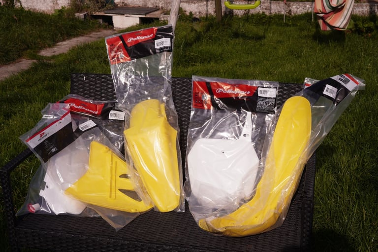 image for Suzuki RM85 plastics guards new in packs motocross