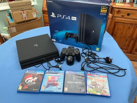 PS4 PRO 1TB, orig box and all leads, 4 games, 1x controller and dock 