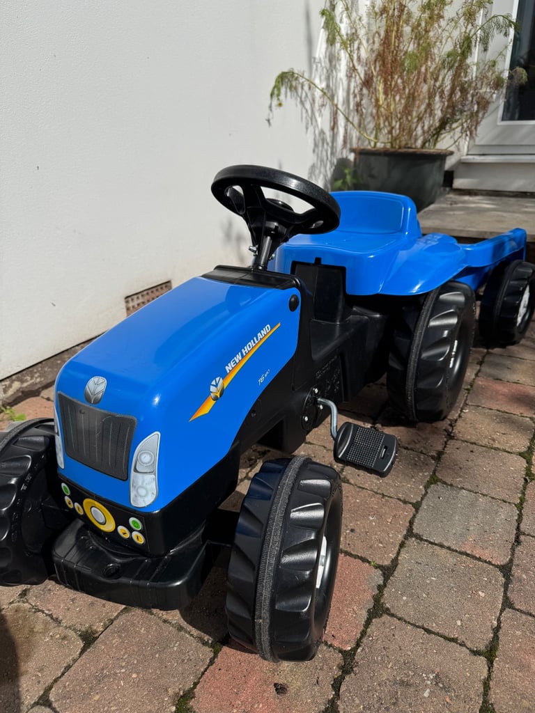 New Holland tractor and trailer 