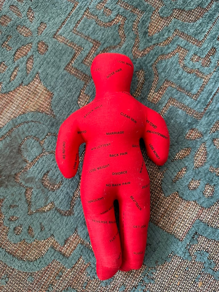 Red Voodoo doll with 2 pins 