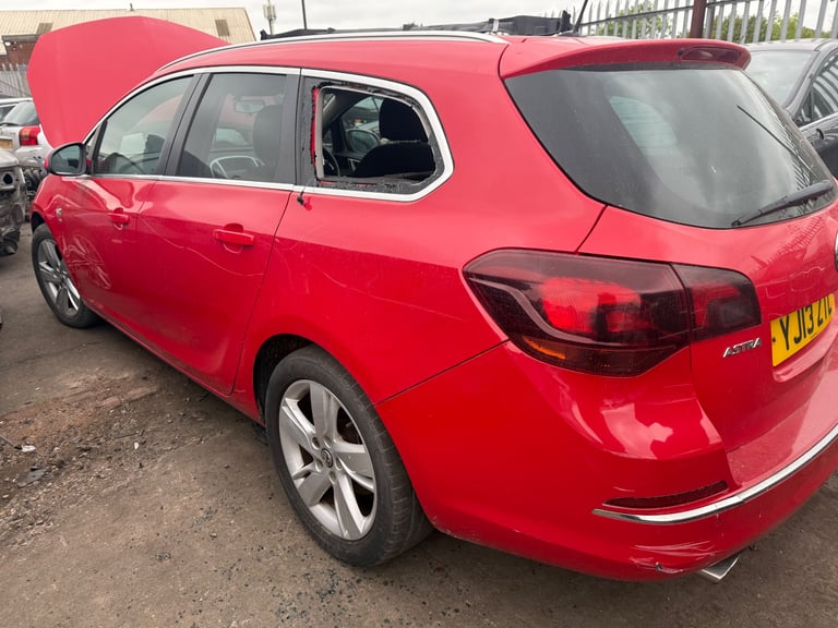 breaking Vauxhall Astra j estate red for parts 2012