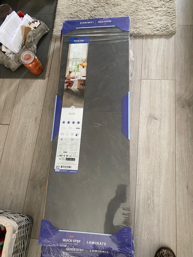 Laminate slate grey tile effect flooring 