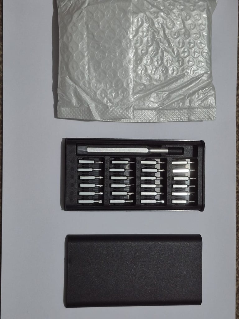 24 Precision Screwdriver Bits and 1 Handle