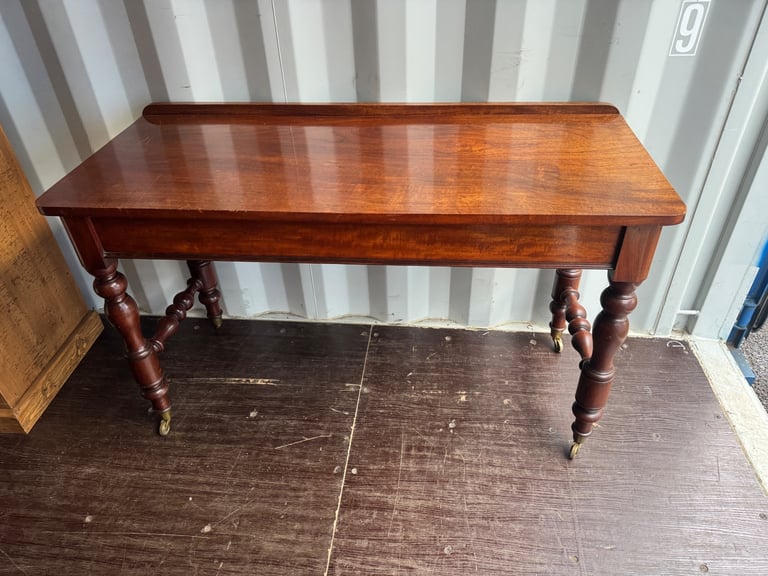 image for Antique table in very good condition on castors possible delivery