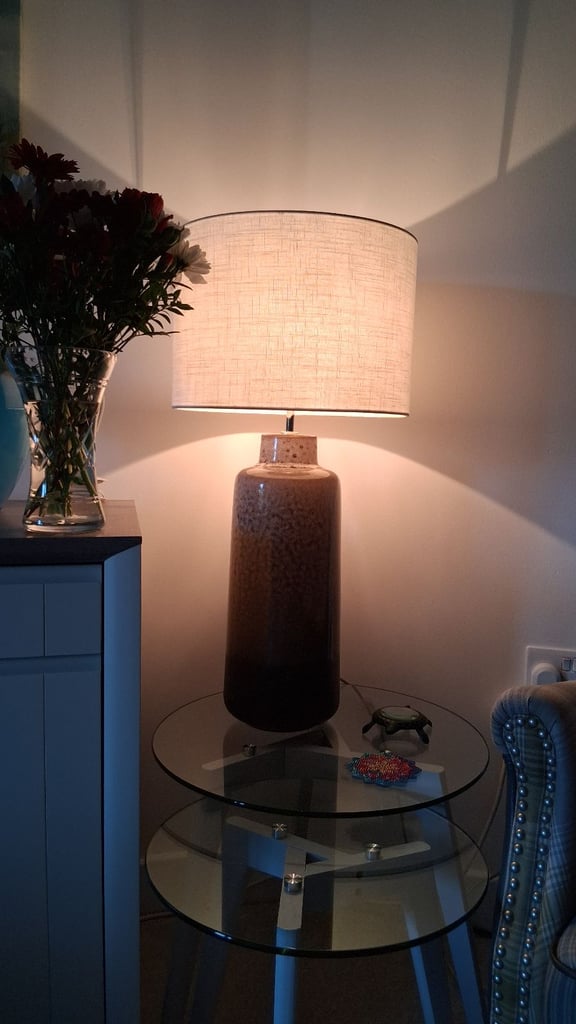 Quality lamp with white shade and 2 cream golden shades.  Almost new