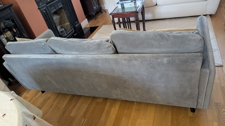 Blue velvet sofa