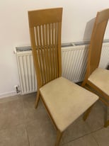 Pair of sterling furniture group oak dining chairs