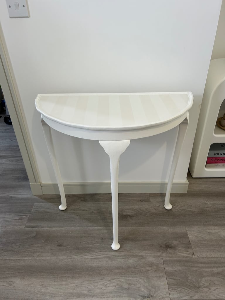 Elegant refinished hall table with ghost stripes