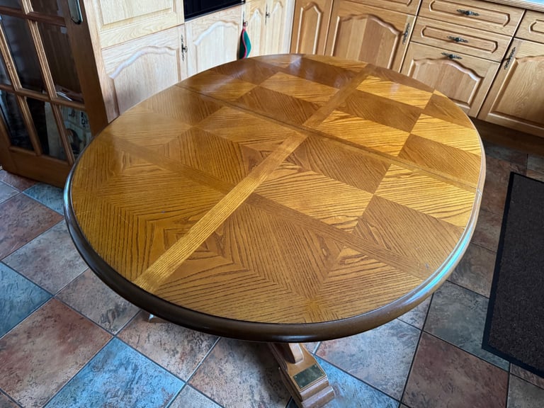 Solid oak extending dining table