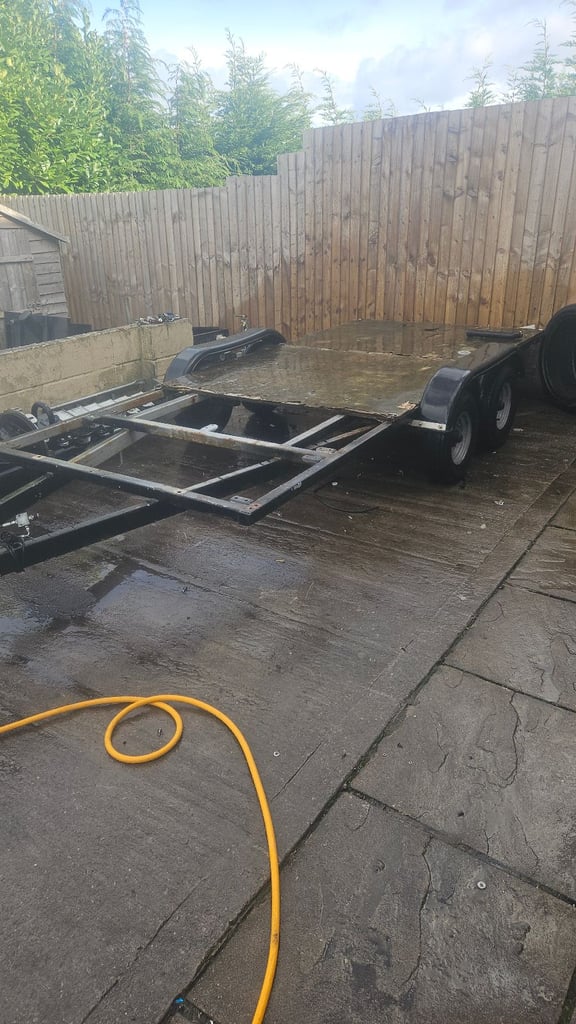 Twin axle flat bed trailer