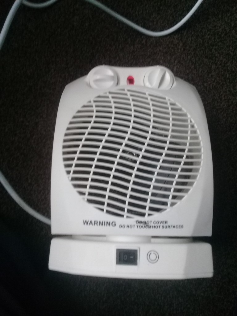 Portable electric fan heater oscillating setting. Pick up Bolton