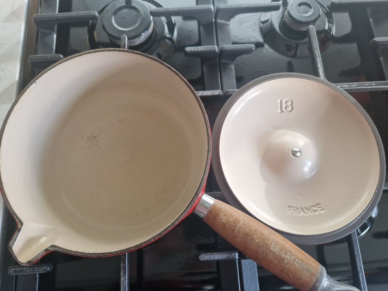 Le Creuset set of 5 pans with lids