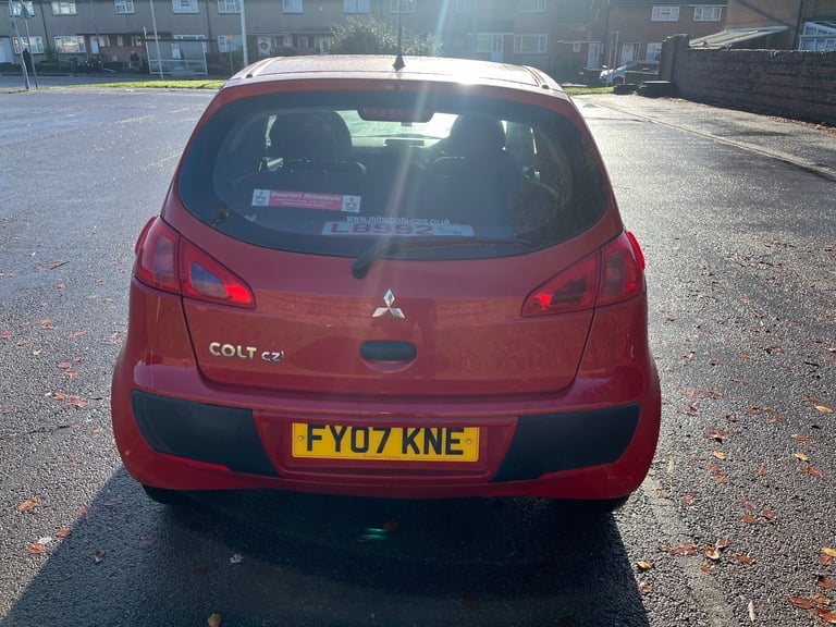 Mitsubishi colt 2007 red 3 door low miles 6 months mot, some history cheap tax and insurance