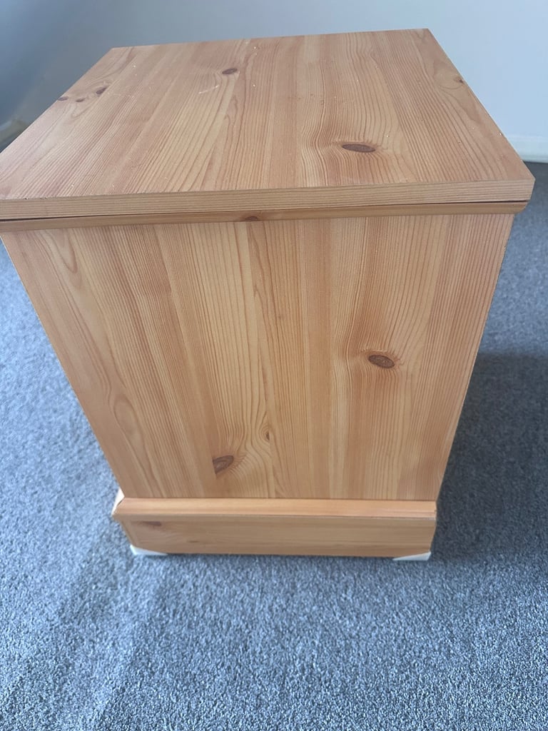 Bedside cabinet on casters 