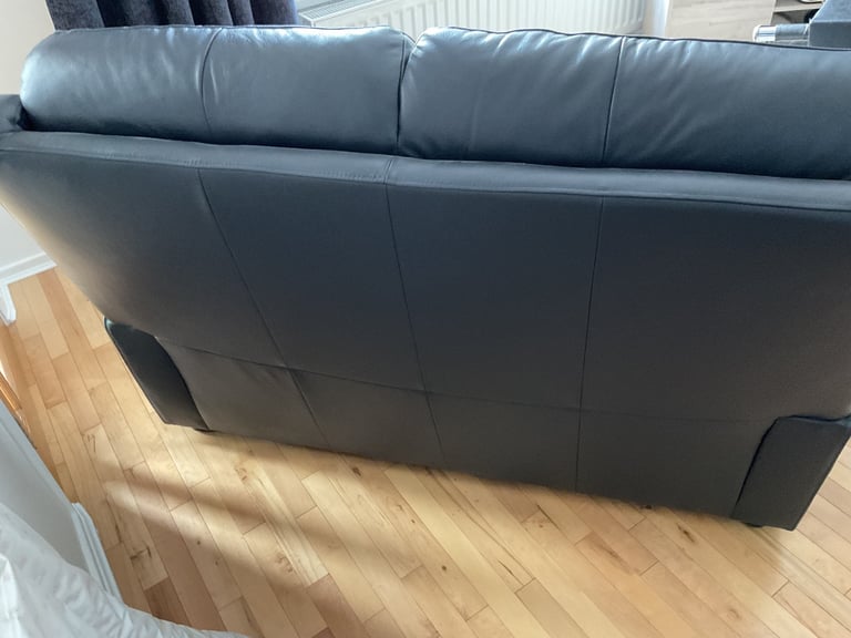 REDUCED PRICE    NEW 2 x 2 seater leather sofas 1 of which is a power recliner