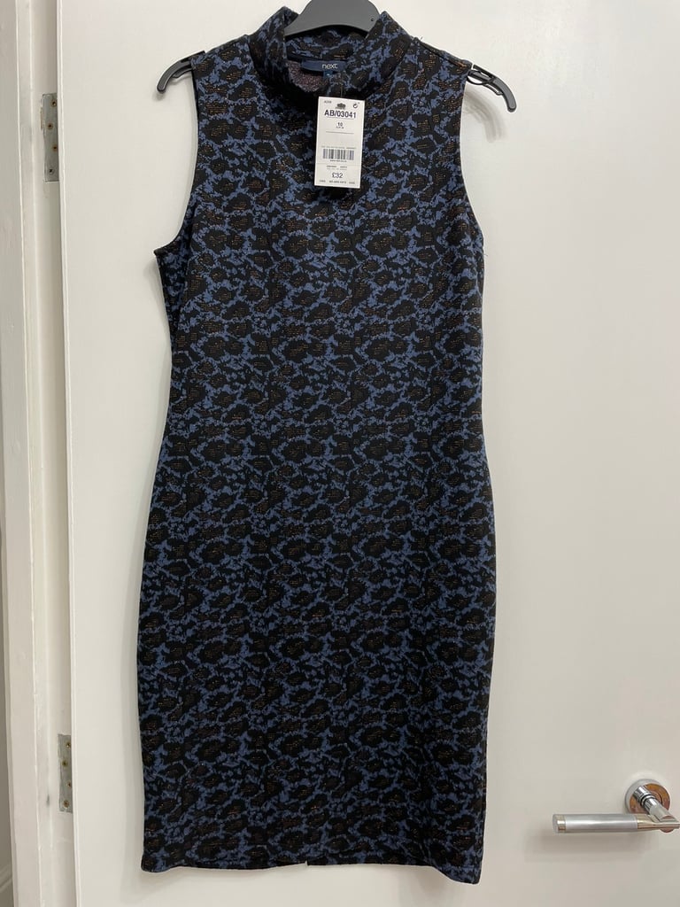 Jacquard turtleneck sleeveless dress for ladies  ( size 10)