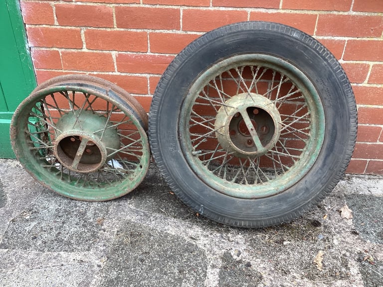 Two Spoked wheels for a vintage car