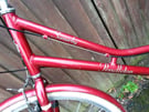 Very smart red ladies bicycle