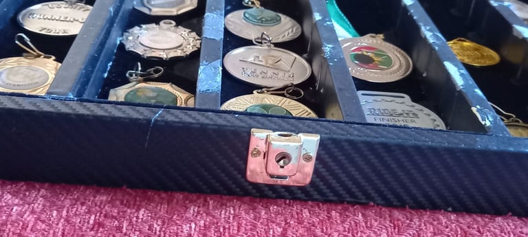 Lockable Display Cabinet With Medals