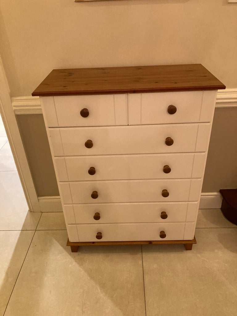 Triple door wardrobe and matching chest of drawers.