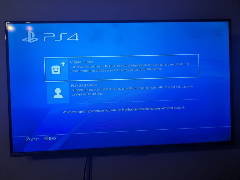 PlayStation 4 console and two controllers 