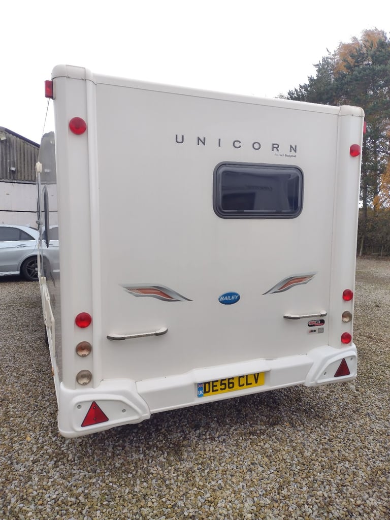 Bailey unicorn Valencia 2012 caravan fixed bed motor mover awning 