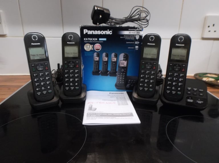panasonic kx tgc424 4 phone set with chargers complete with answering machine
