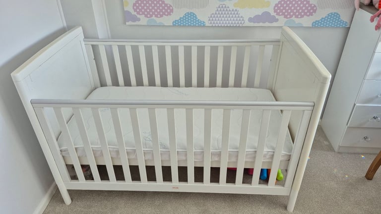 White Babymore drop side cot bed