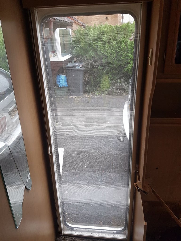 Main door fly nets for camper, caravan, motorhome or boat.