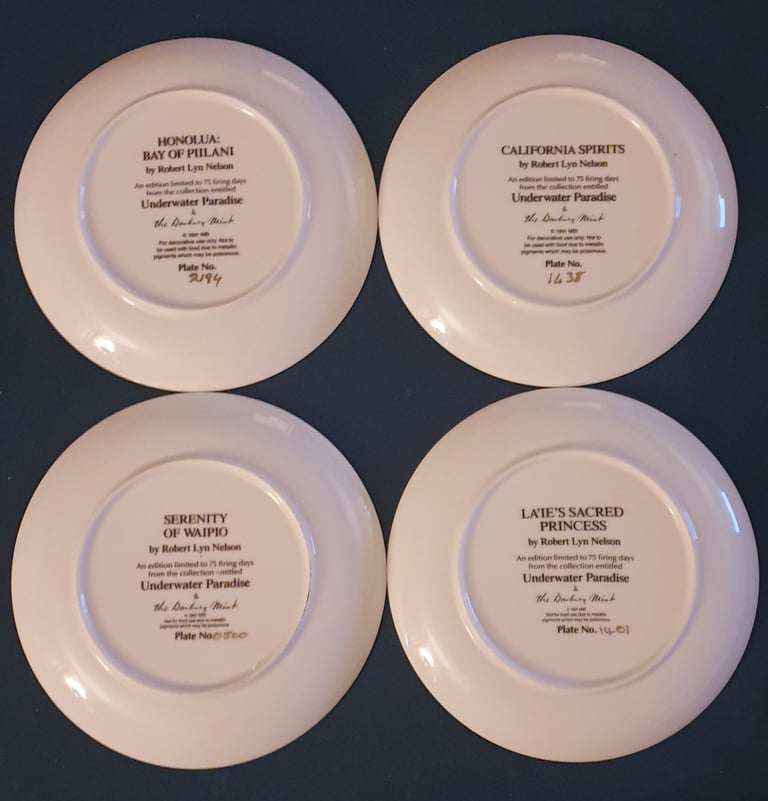 Collection of 4 Danbury Mint Underwater Paradise plates - boxed with stands