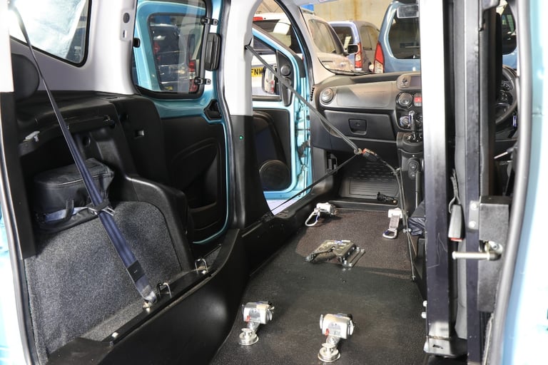 Qubo Auto Wheelchair Passenger Rides Upfront Next to The Driver WAV Cars 