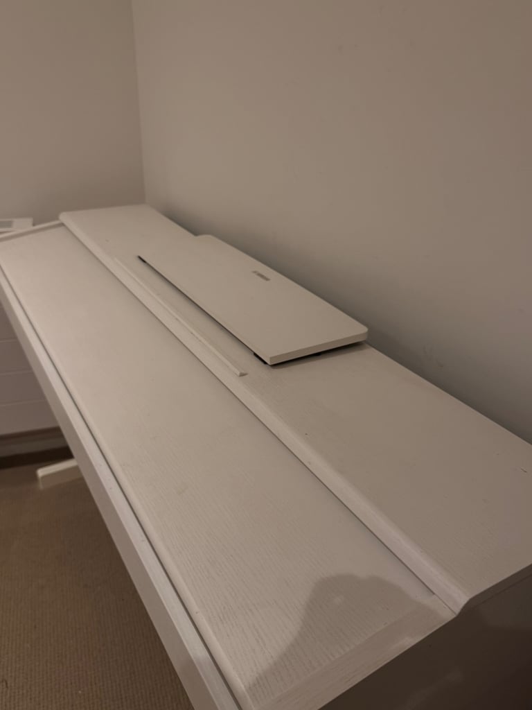 Yamaha white Piano in great condition ( like new) for £500