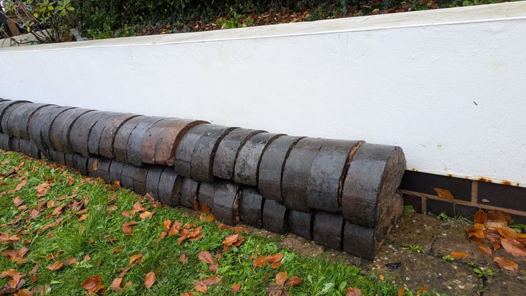 Reclaimed blue half-round bricks