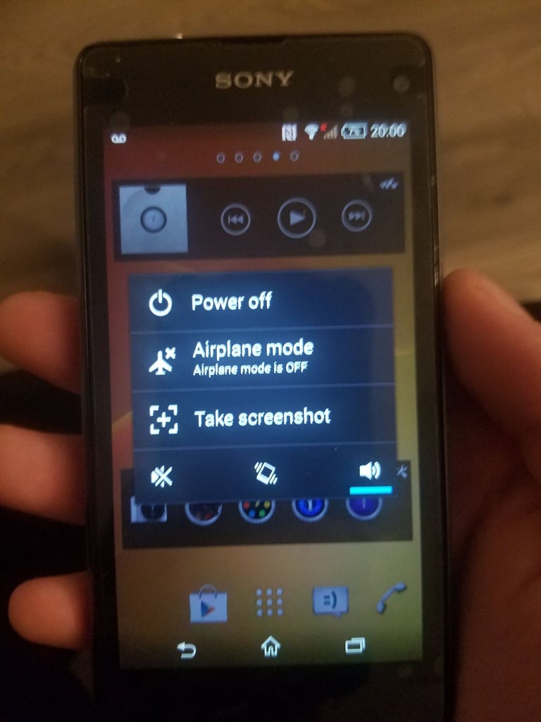 Black sony mobile with charger