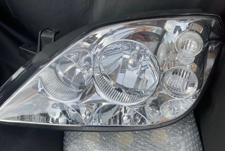 New Nissan PRIMERA p12 headlight passenger side 