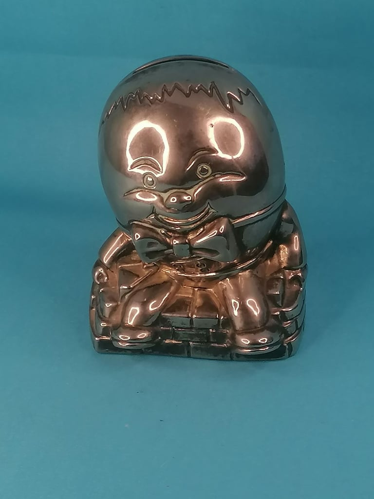 Vintage Humpty Dumpty Silver Plated Metal Coin Bank Money Box.. Missing one part.