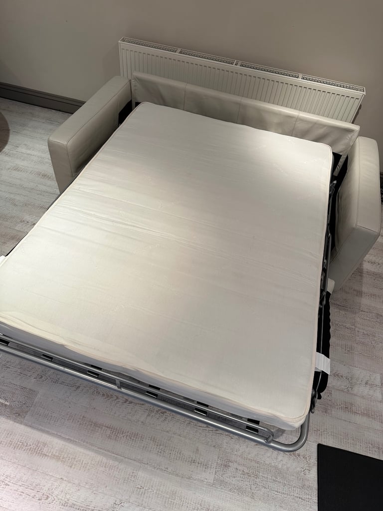 Natuzzi (Brand) cream leather sofa bed 