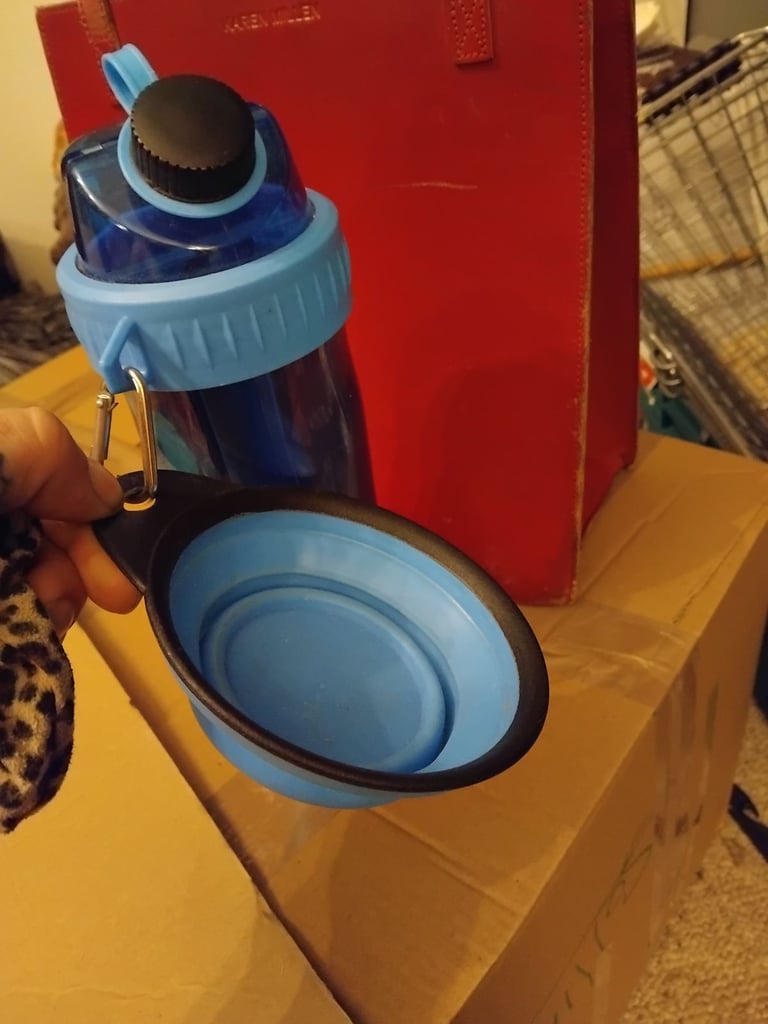 image for Dog water bottle with push out bowl attached 