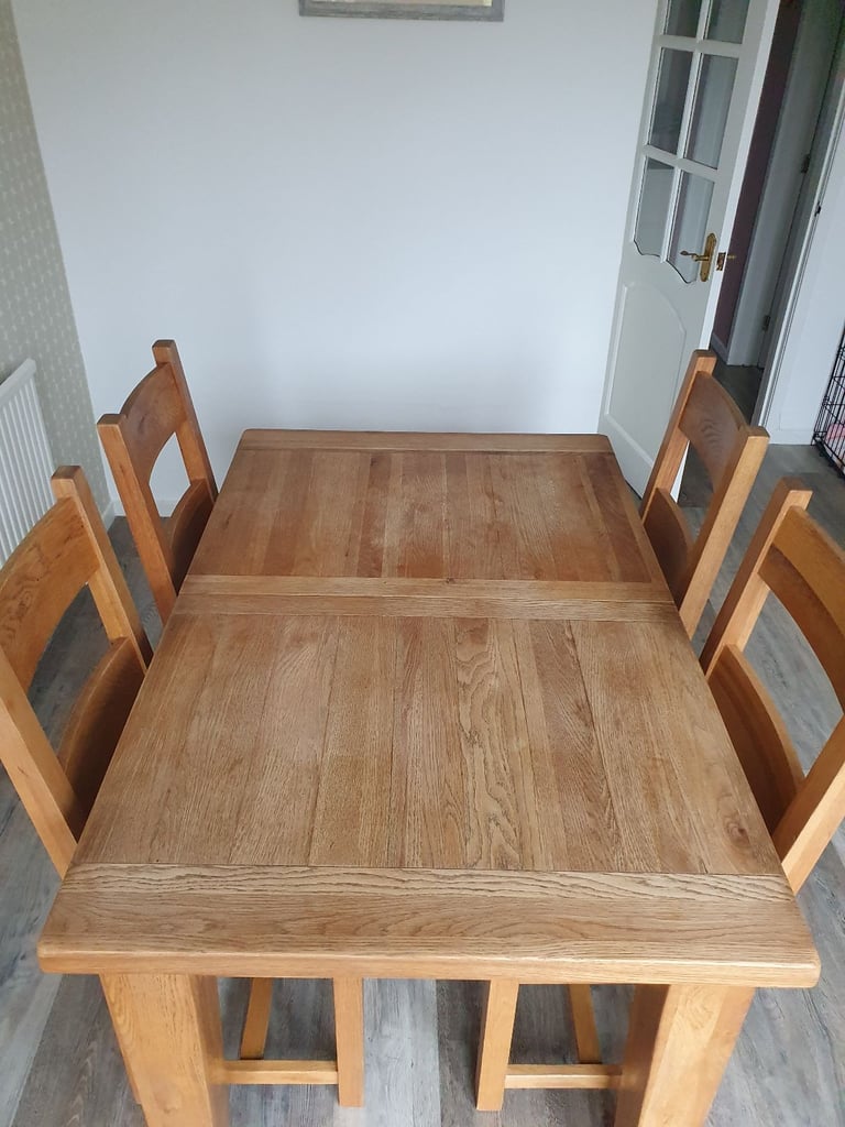Oak furniture land solid wood extendable dinning table and chairs