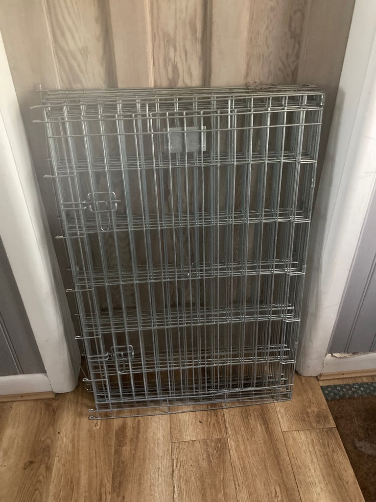 SAVIC 8 panel hinged dog pen with a door. Each panel is 3ft by 2ft  forming a variety of shapes: