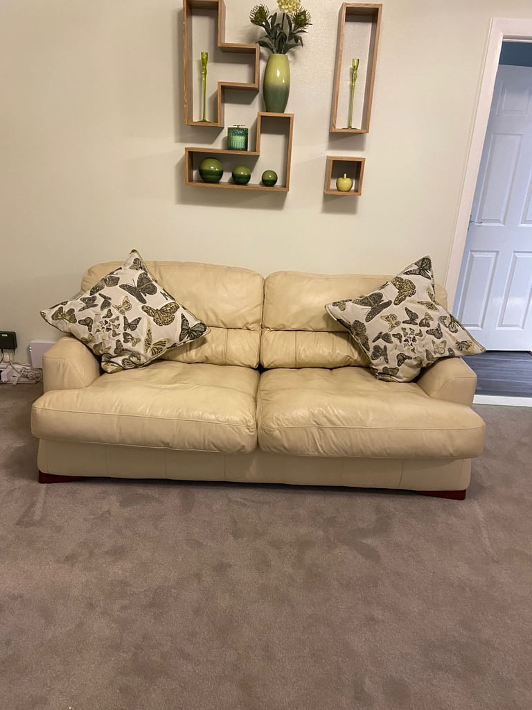 Cream leather sofa bed