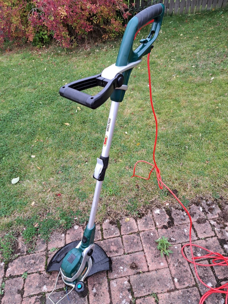 Strimmer with adjustable handle