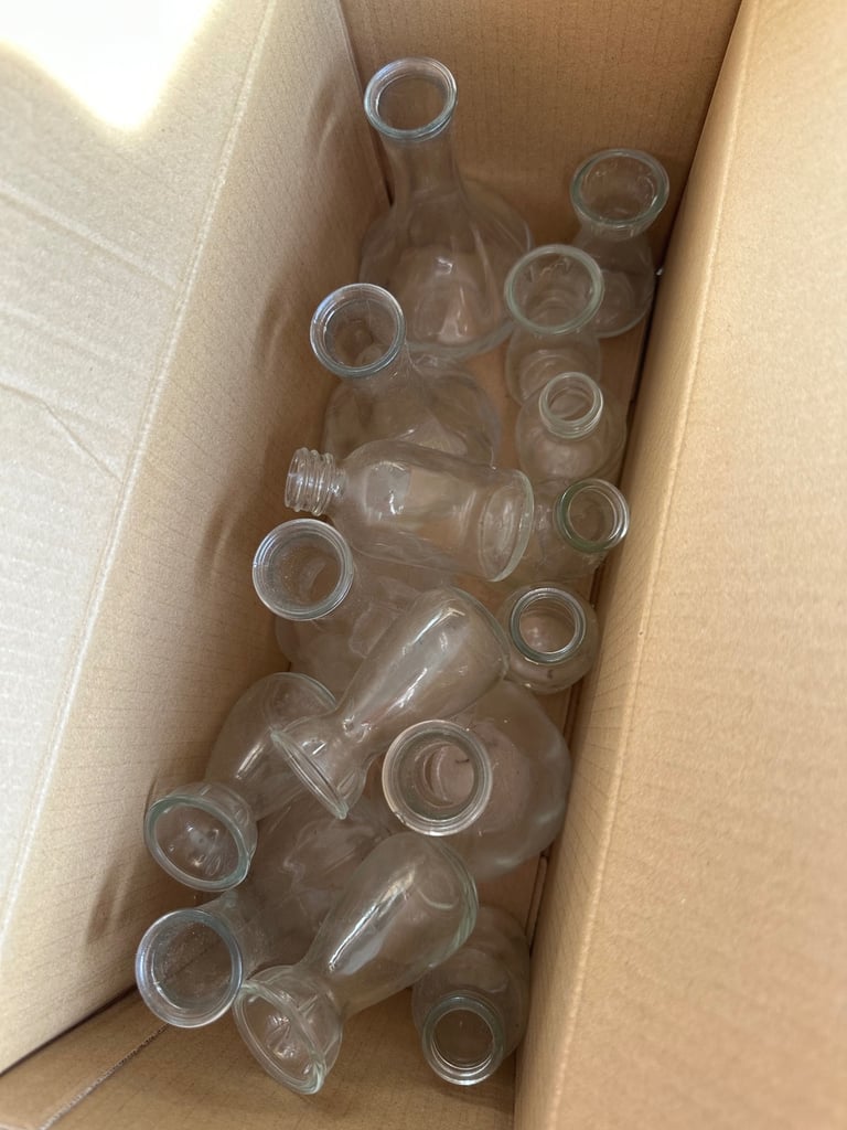 Collection of small glass jars 