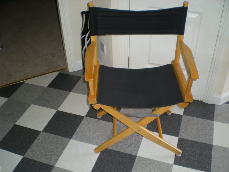 Habitat wooden directors chair. Good quality directors chair with black material seat and back.