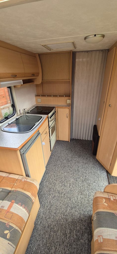 4 berth caravan fixed bed with motor mover 