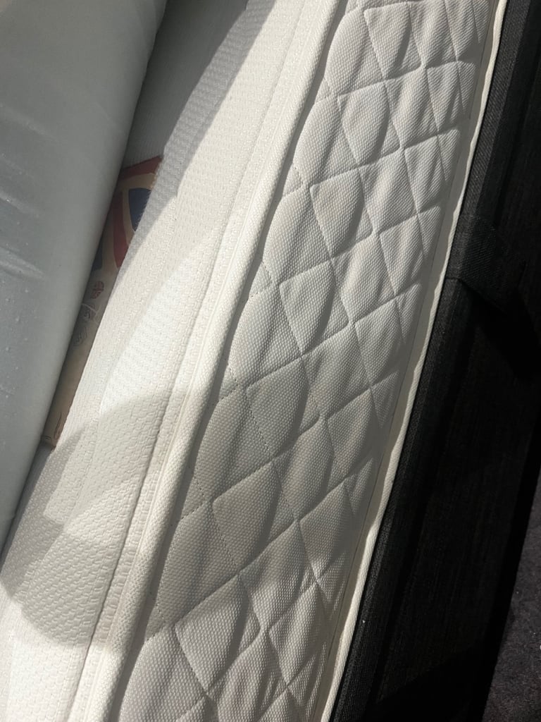 King size mattress with mattress topper included