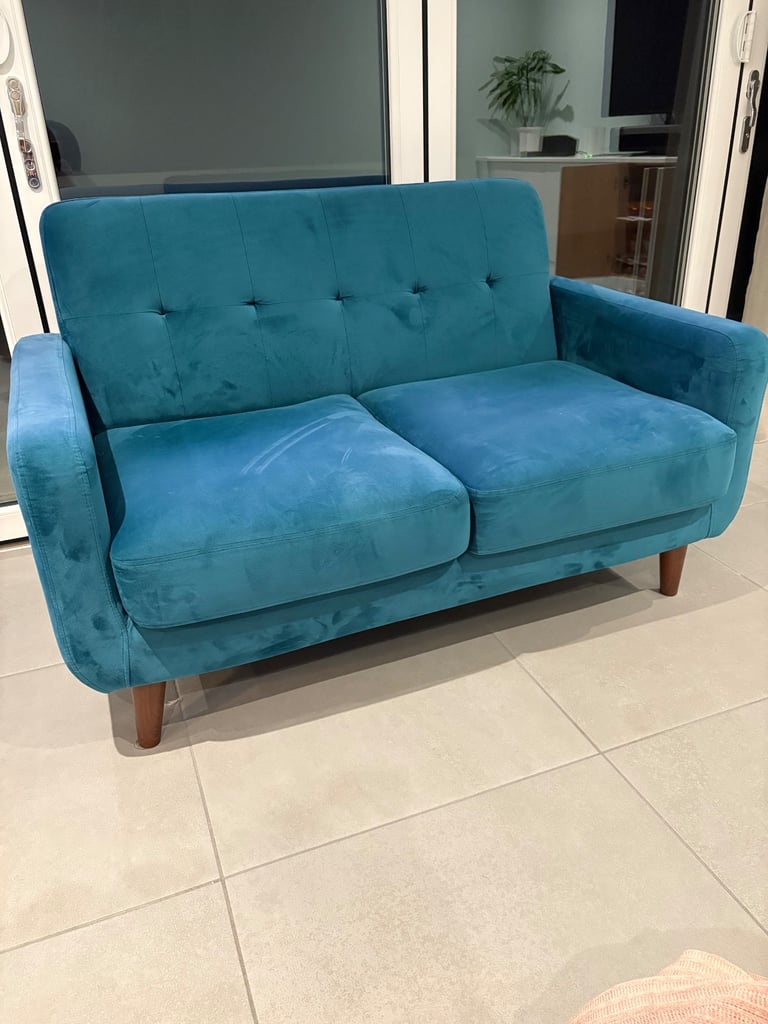 Teal green sofa