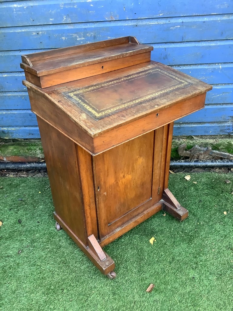 Victorian walnut brown leather insert davenport with ink wells & wheel castors