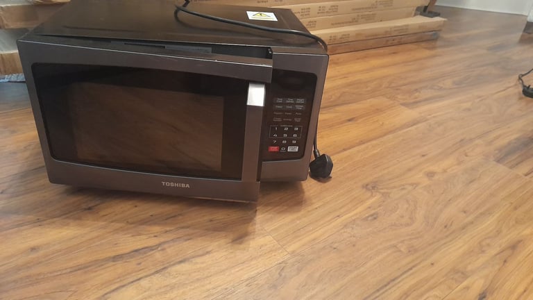 image for Toshiba microwave oven perfect condition £25. Grey/black 